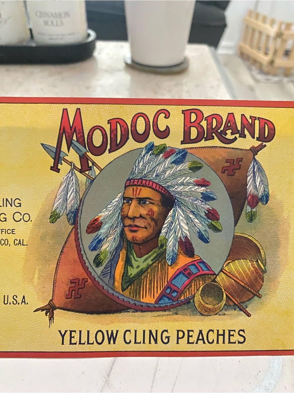 Vintage Turn of Century label 1900 peaches. Featuring American Indigenous Indian